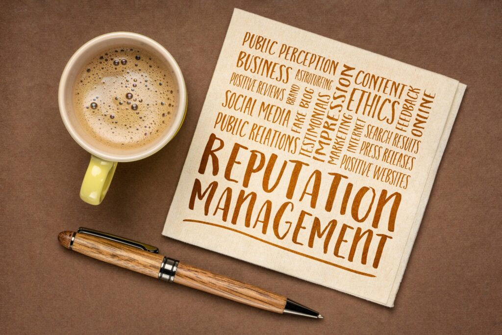 A cup of coffee, a pen, and a notepad saying “reputation management”. Here’s Why Listings and Reputation Management Is Very Relevant in 2023